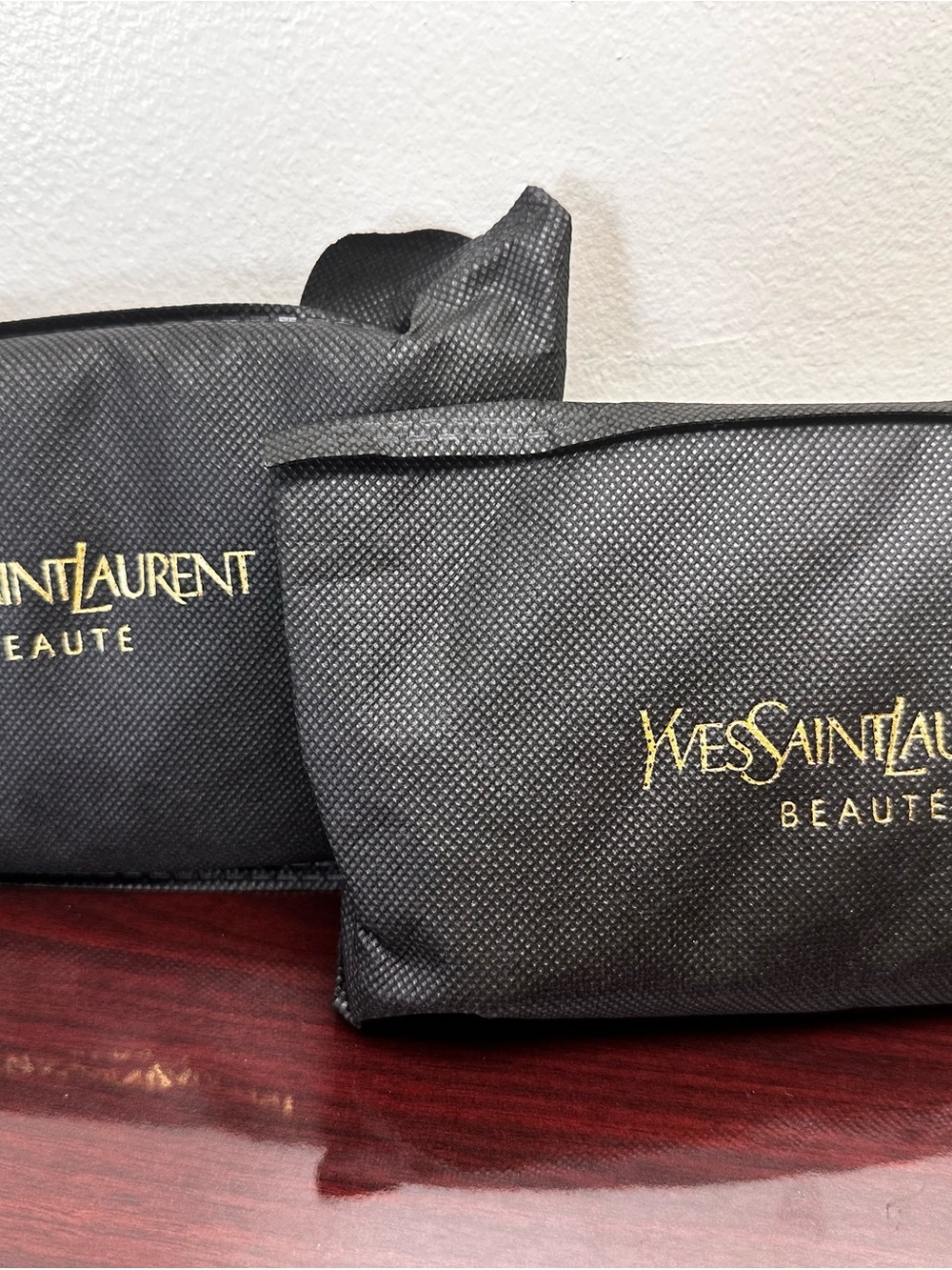 Yves Saint Laurent Black Cosmetic Pouch with Gold Logo